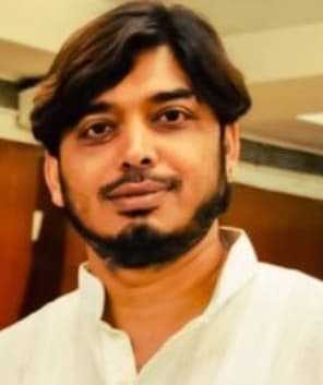 Suman Maitra — Director
