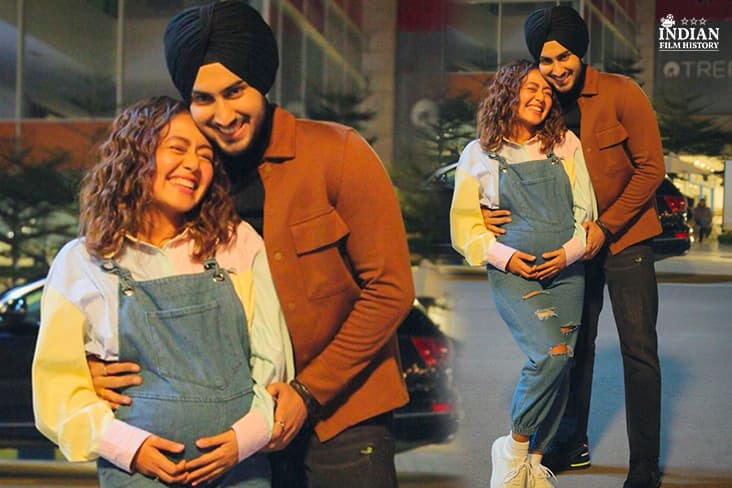 Neha Kakkar Seen Cradling Her Baby Bump