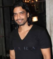 Maqbool Khan — Director