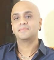 Joi Barua — Music Director